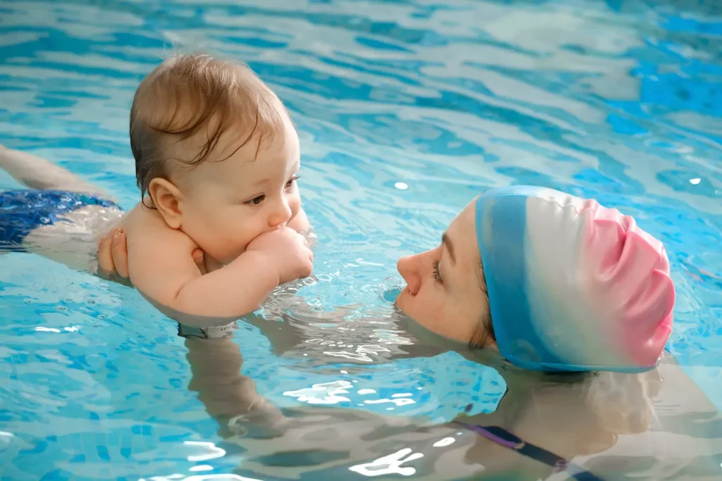 A mother and baby bonding in the water
