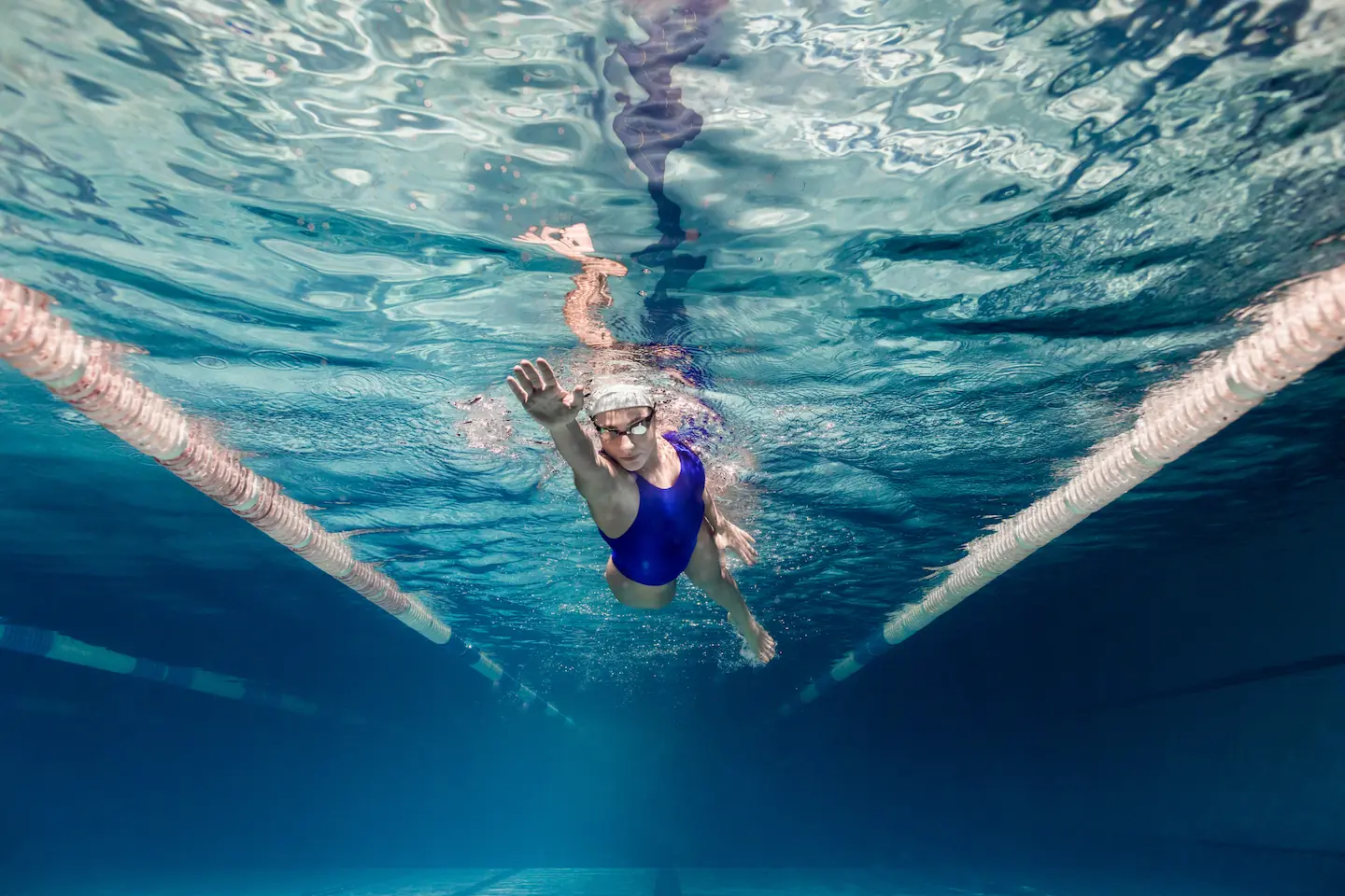 Woman swimming after learning to swim in a female only lesson
